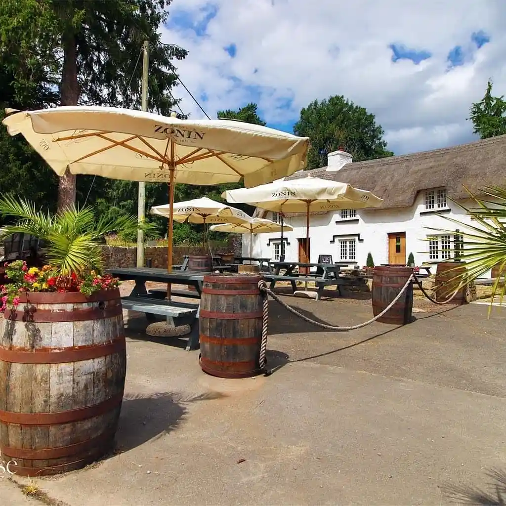 Garden tables and parasols at The Horse and Jockey