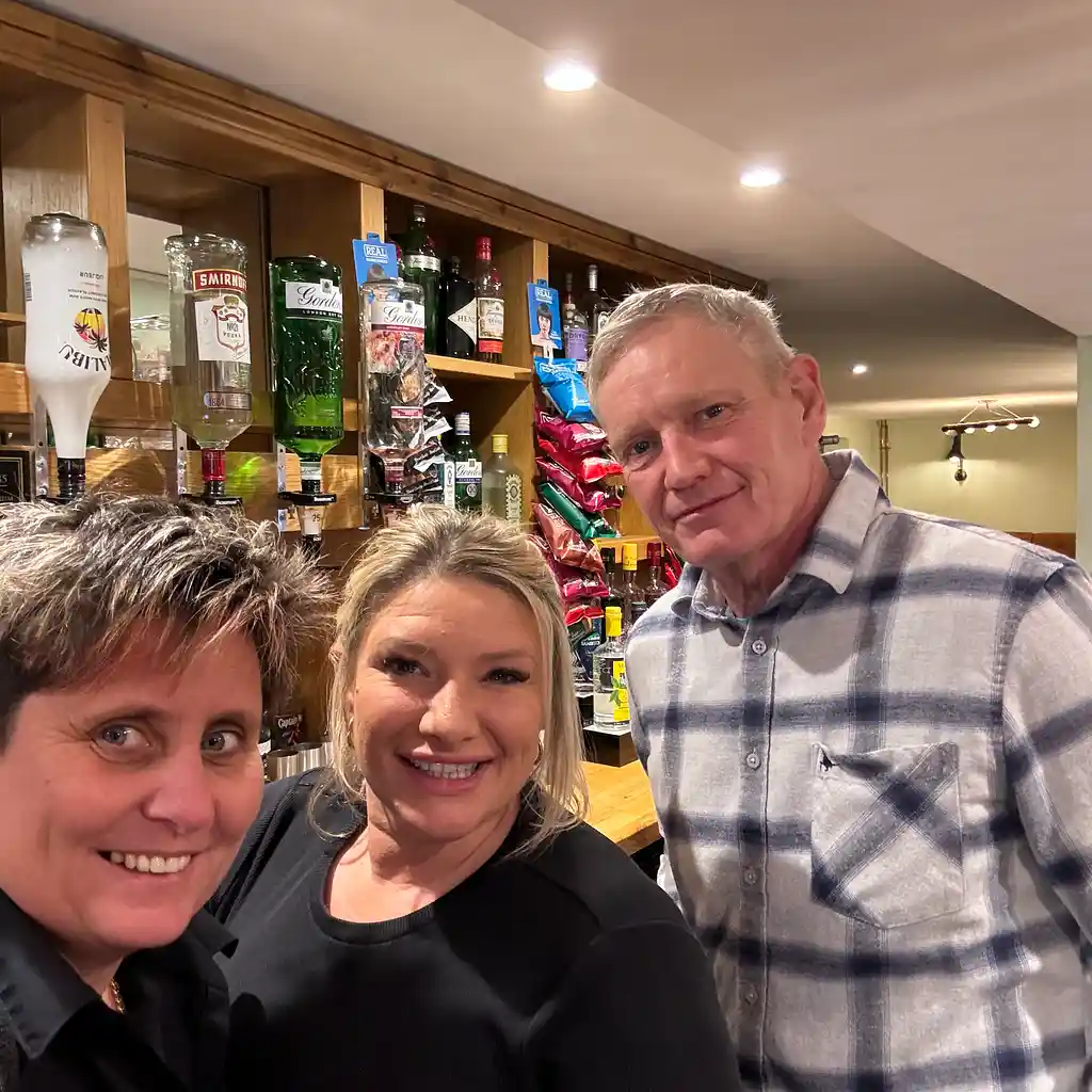 Guests at the bar at The Horse and Jockey